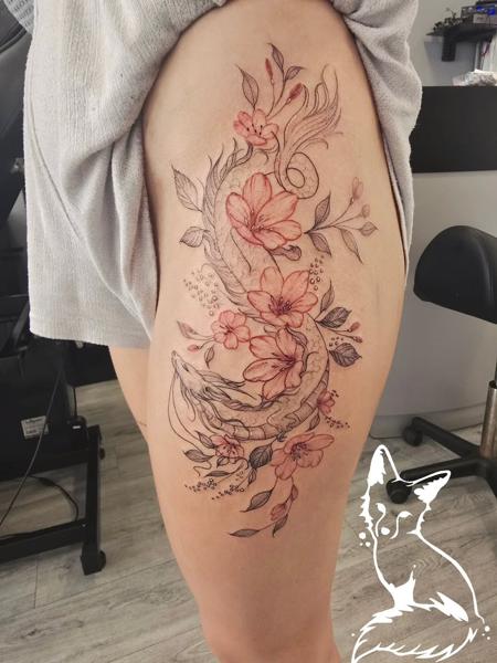 Fine line floral dragon tattoo by @foxytattooartist