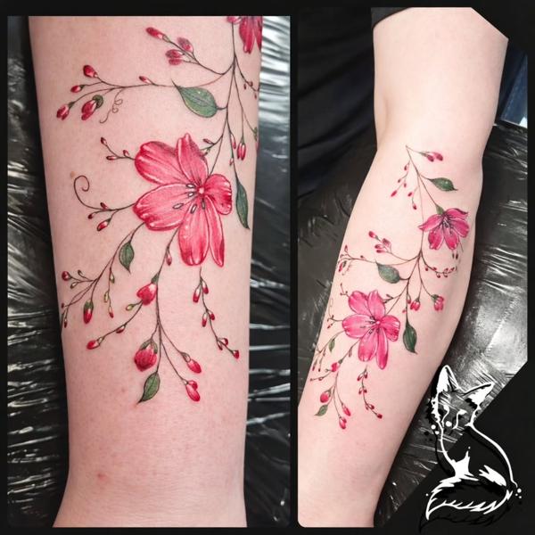 Fine line floral branch tattoo by @foxytattooartist