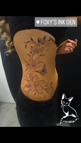 Fine line floral butterfly tattoo by @foxytattooartist