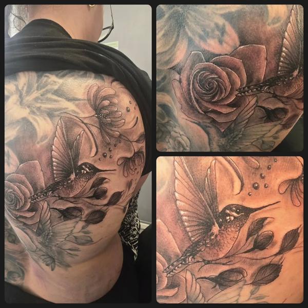 Realism hummingbird and flowers tattoo by @foxytattooartist