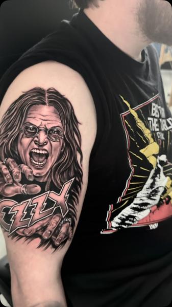 Realism rock musician portrait tattoo by @gardner_ink