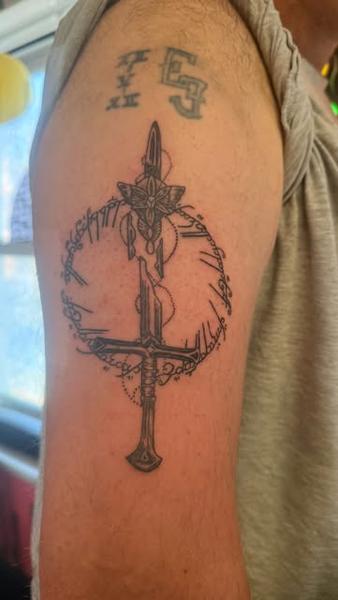 Illustrative broken sword ring tattoo by @fkry_tattoo