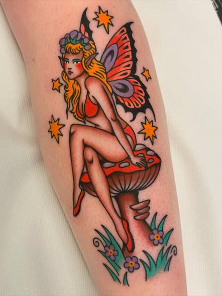 Traditional fairy mushroom tattoo by @gemcartertattoo