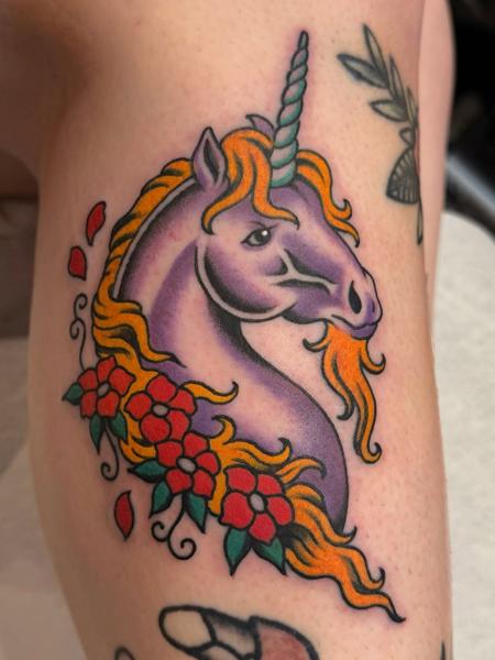 Neo-traditional floral unicorn tattoo by @gemcartertattoo