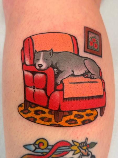 Illustrative sleeping dog tattoo by @gemcartertattoo