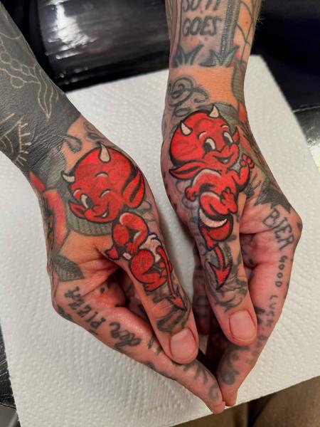 Traditional cartoon devil tattoo by @gemcartertattoo