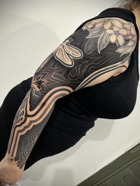 Blackwork floral moth tattoo by @gempintattoo
