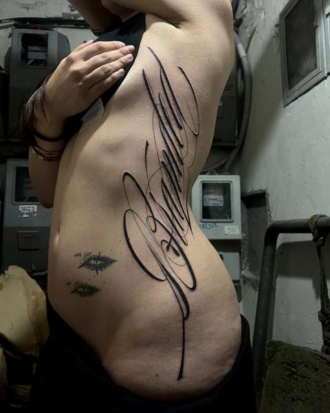 Script script lettering tattoo by @_kizal