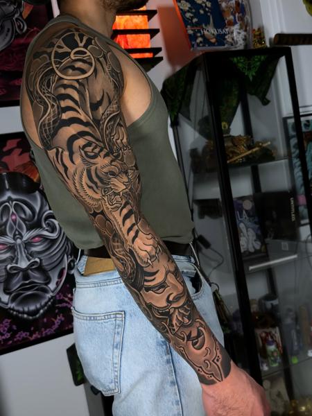 Japanese tiger and snake tattoo by @taish.one