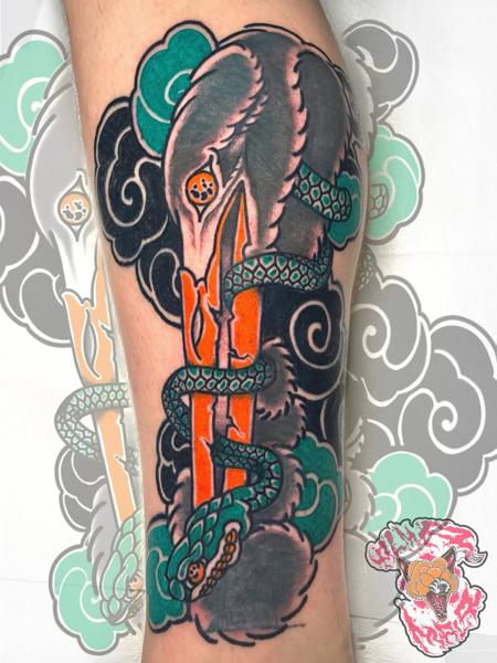 Neo-traditional animal skull snake tattoo by @alma_mala_tattoo