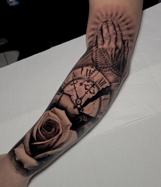 Realism praying hands tattoo by @gekodivine