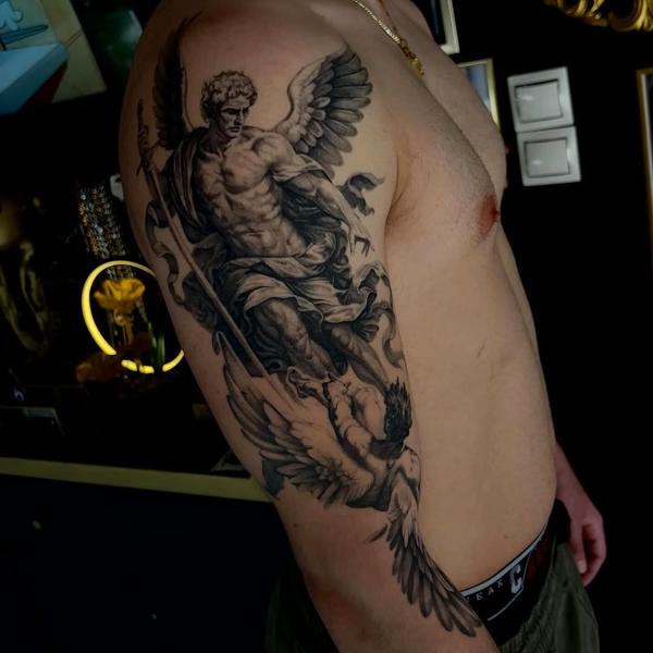 Realism angel battle tattoo by @gekodivine