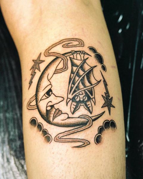 Traditional moon and bat tattoo by @geonik.tattoo