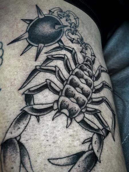 Blackwork scorpion mace tattoo by @george_thirst