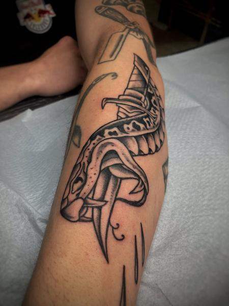 Traditional snake dagger tattoo by @george_thirst