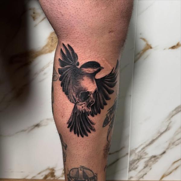 Realism flying bird tattoo by @gatostattoo_