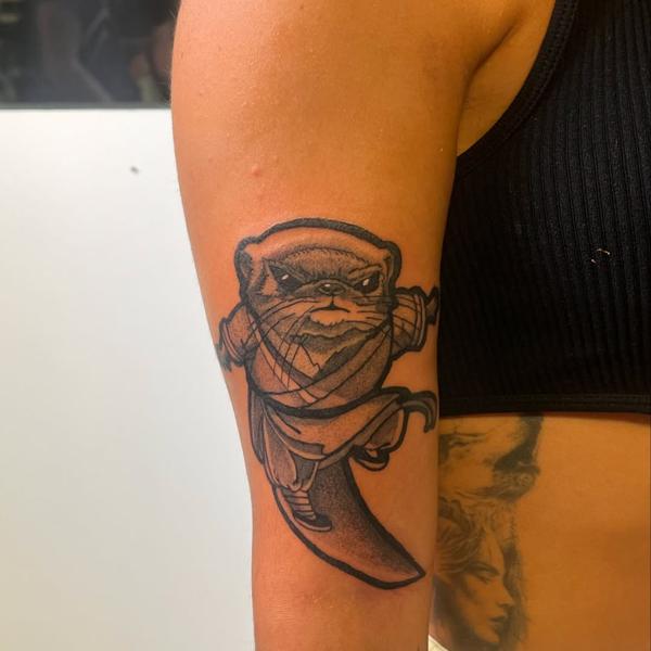 Illustrative kung fu otter tattoo by @agave_tattoo