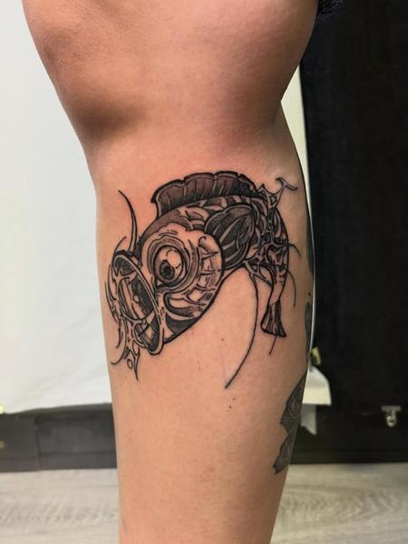 Blackwork stylized fish tattoo by @agave_tattoo