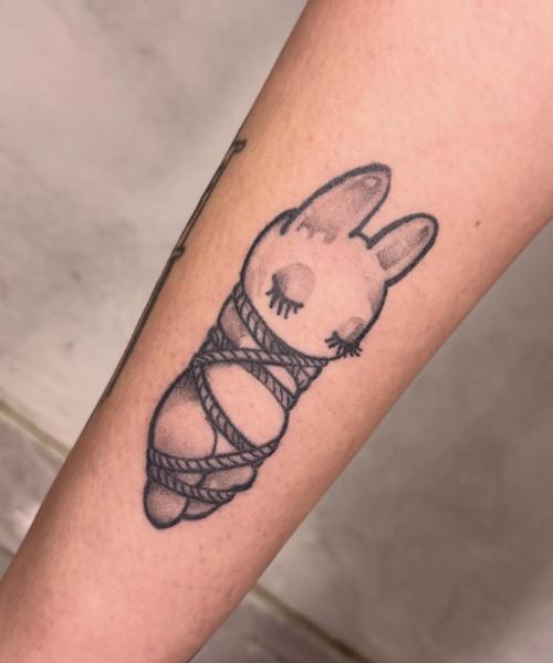 Illustrative bound bunny tattoo by @agave_tattoo
