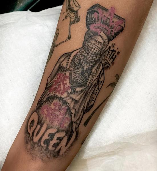Blackwork masked figure tattoo by @kazatattoos