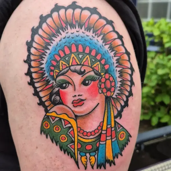 Traditional headdress woman tattoo by @georgiamarshalltattoo