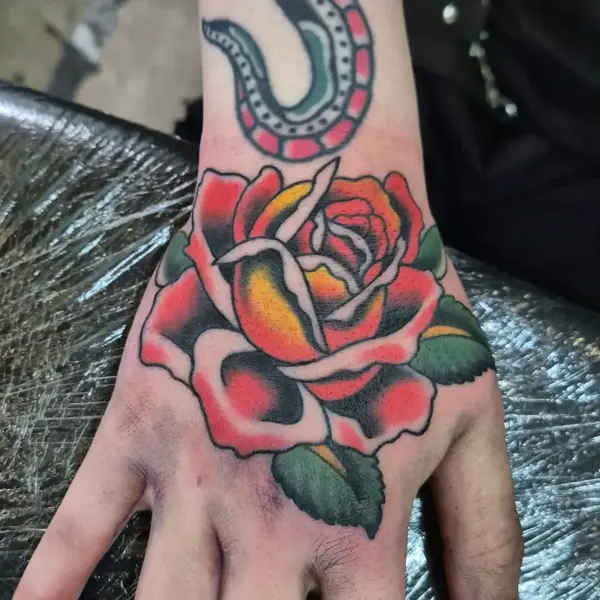 Traditional traditional rose tattoo by @georgiamarshalltattoo