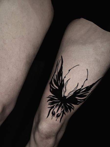 Blackwork abstract butterfly tattoo by @lahaine_tattoo