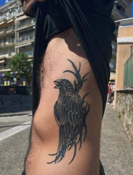 Blackwork raven tattoo by @lahaine_tattoo
