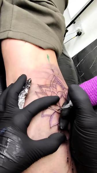Geometric geometric flower tattoo by @georgie_carville_tattoo