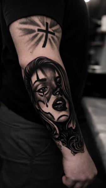 Realism crying woman tattoo by @vanya.tattoo