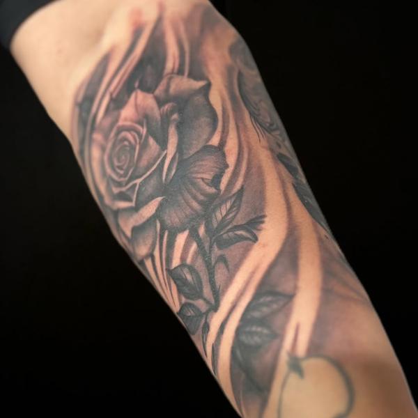 Realism floral rose tattoo by @vanya.tattoo