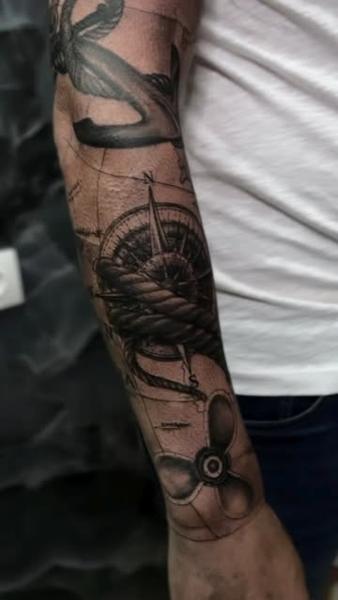 Realism nautical compass tattoo by @vanya.tattoo