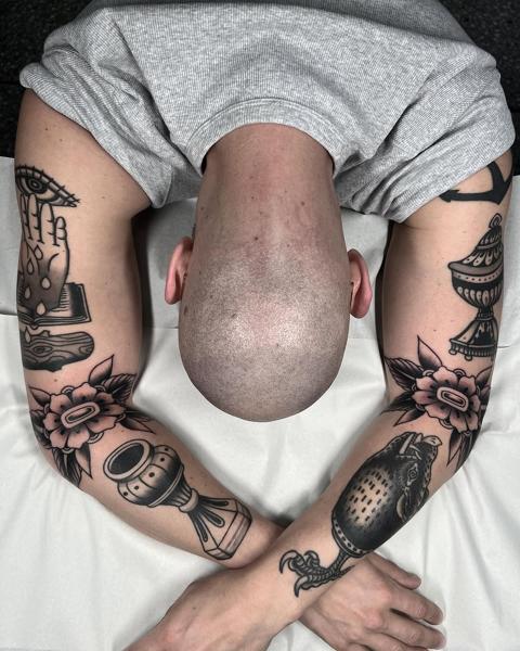 Traditional symbolic objects tattoo by @danetattoo