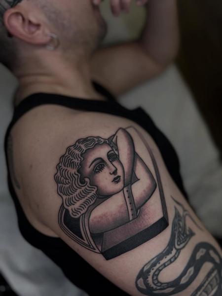 Illustrative framed woman portrait tattoo by @danetattoo