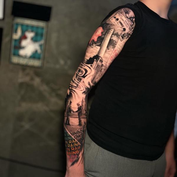 Realism cityscape collage tattoo by @_mikotattoo