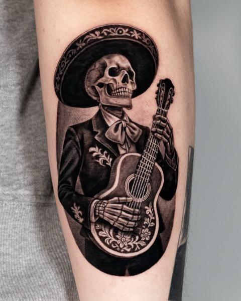 Realism skeleton mariachi tattoo by @giaroseroart