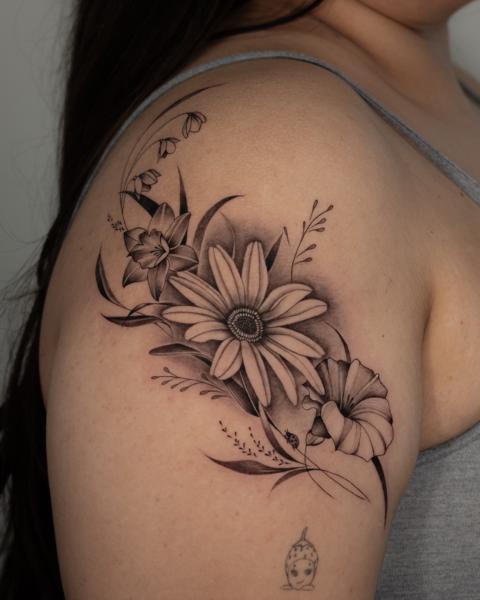 Black And Grey Realism floral arrangement tattoo by @giaroseroart