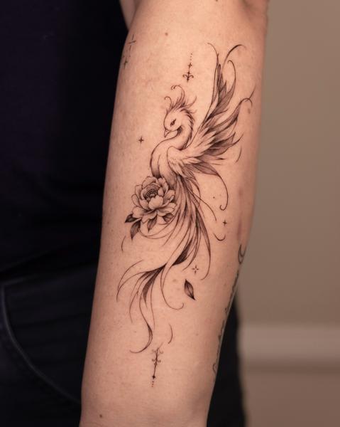 Fine Line phoenix and flower tattoo by @giaroseroart