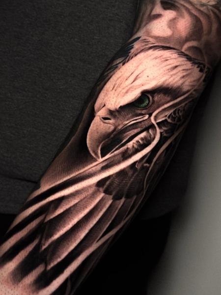 Realism eagle portrait tattoo by @painciler