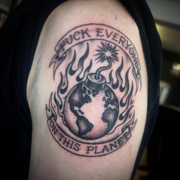 Traditional flaming earth tattoo by @gnarly_.charlie_