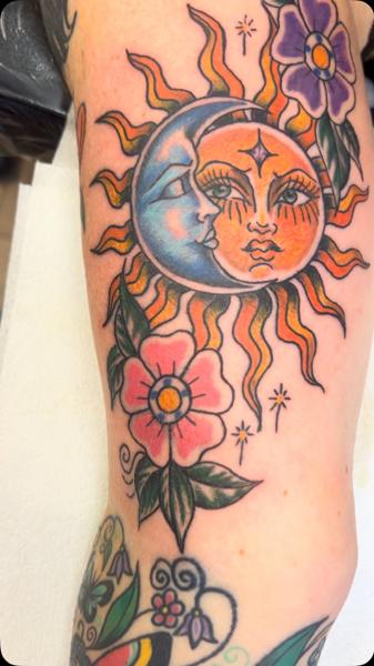 Traditional sun and moon tattoo by @gnarly_.charlie_