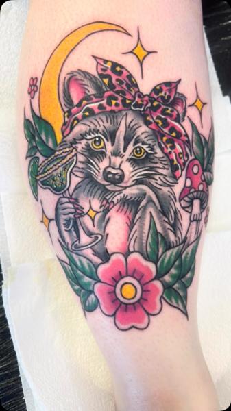 Traditional raccoon with moon tattoo by @gnarly_.charlie_