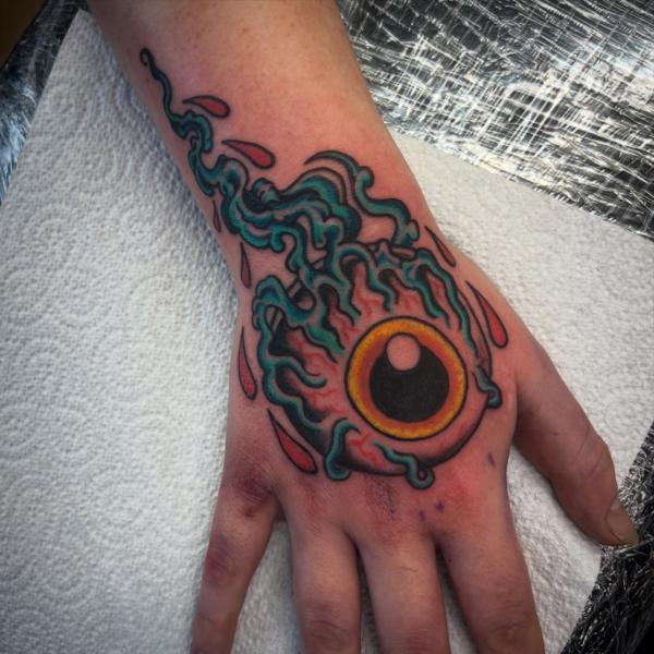 Traditional flaming eyeball tattoo by @gnarly_.charlie_