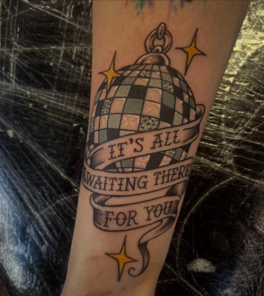 Traditional disco ball tattoo by @gnarly_.charlie_