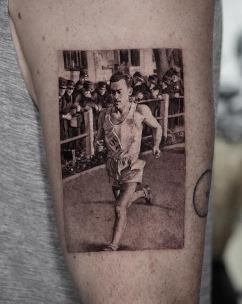 Realism runner portrait tattoo by @goldy_z