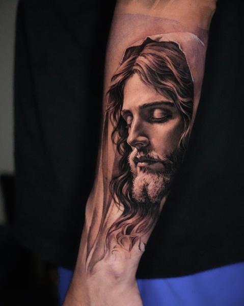 Realism jesus portrait tattoo by @goldy_z
