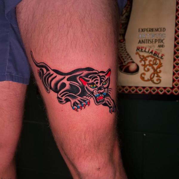 Traditional crawling panther tattoo by @bad_news_tattoos