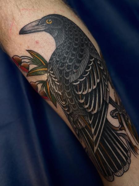 Traditional raven tattoo by @bad_news_tattoos