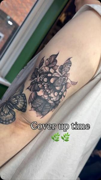 Illustrative black and grey ornamental floral tattoo by @gracebtattoos