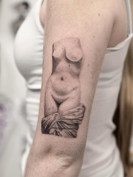 Realism classical statue tattoo by @griff.tattoo